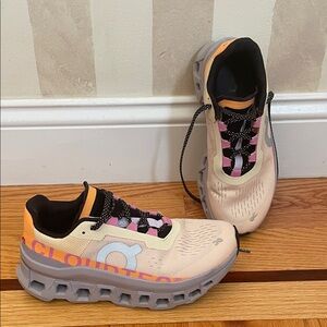 On Running Shoes in Cream, Pink, and Gray